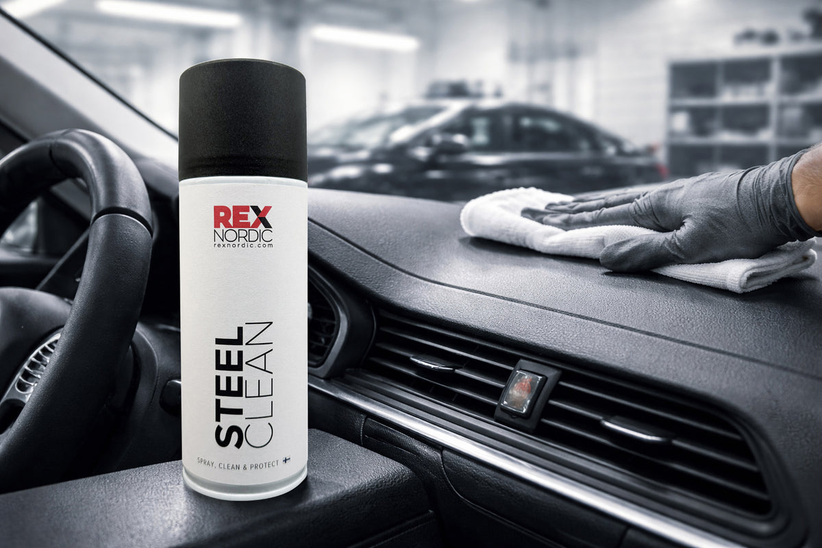 Wiping a car dashboard, REX SteelClean in the foreground