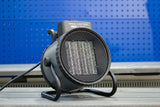 REX NORDIC HEAT 3000 fan heater on a workshop bench, front view