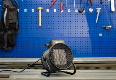 REX NORDIC HEAT 3000 fan heater heating a workshop space
