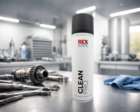REX CleanPro degreaser next to a gear shaft and wrenches