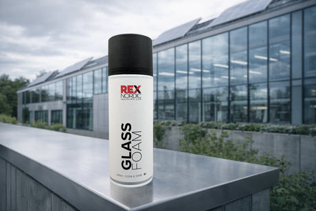 REX GlassFoam cleaner in front of a glass-walled building