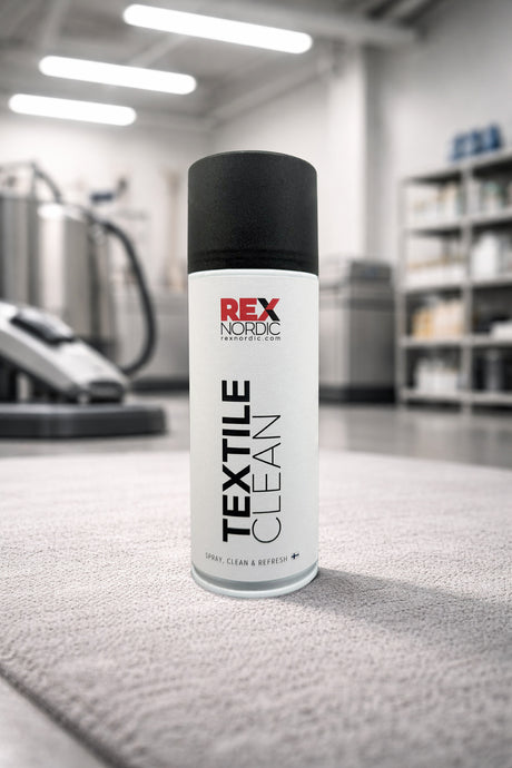 REX TextileClean foam cleaner on a carpet next to a carpet-cleaning machine