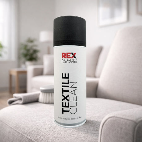 REX TextileClean foam cleaner on a sofa